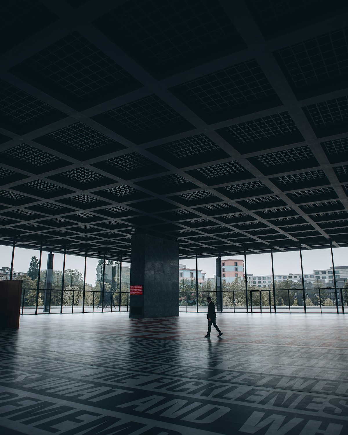 Empty hall with full-height windows